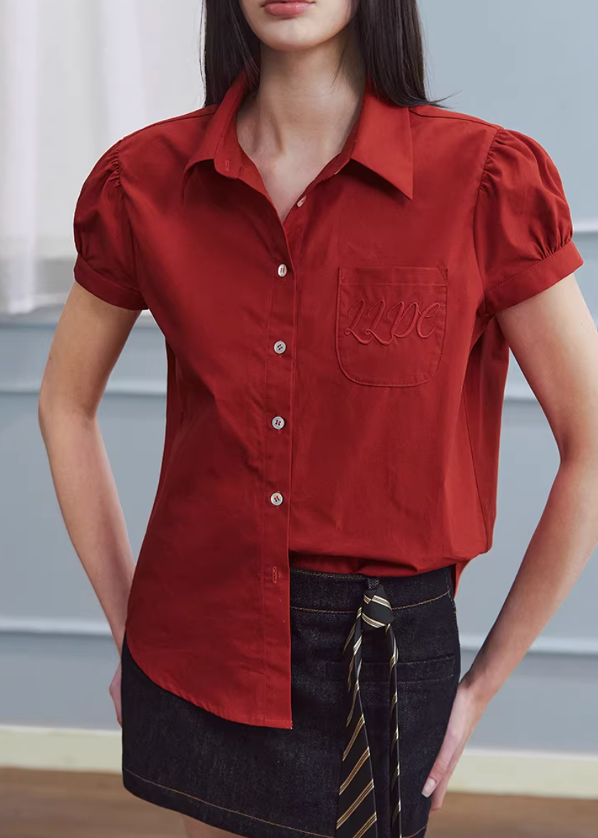 red shirt women, cotton blouse women, puff sleeve shirt, korean fashion top, spring outfits 2026, casual spring outfits, college style shirt women, structured blouse women, aesthetic fashion top, modern feminine clothing, versatile everyday top, chic casual outfit, parisian style clothing, fitted shirt women, breathable cotton top, refined casual wear, vintage style shirt, spring wardrobe essential, minimal style blouse, classic button shirt