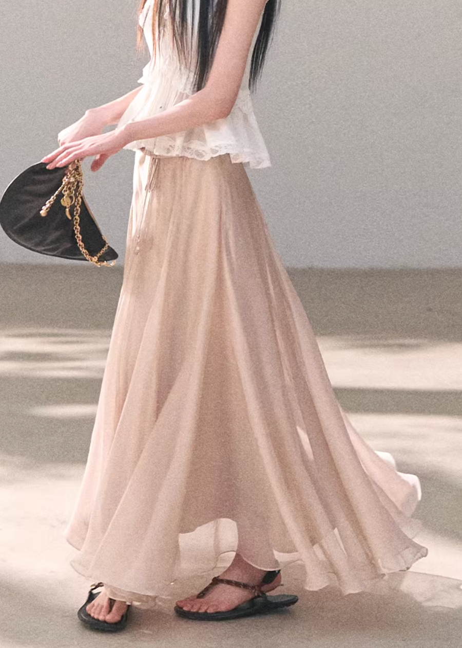 organza skirt women, flowy maxi skirt, korean fashion skirt, spring outfits 2026, casual spring outfits, sheer layered skirt, lightweight long skirt, feminine elegant skirt, soft aesthetic outfit, breathable summer skirt, modern feminine clothing, parisian style clothing, versatile long skirt, refined casual wear, airy fabric skirt, chic everyday outfit, minimal elegant skirt, spring wardrobe essential, soft flow skirt, calm luxury style