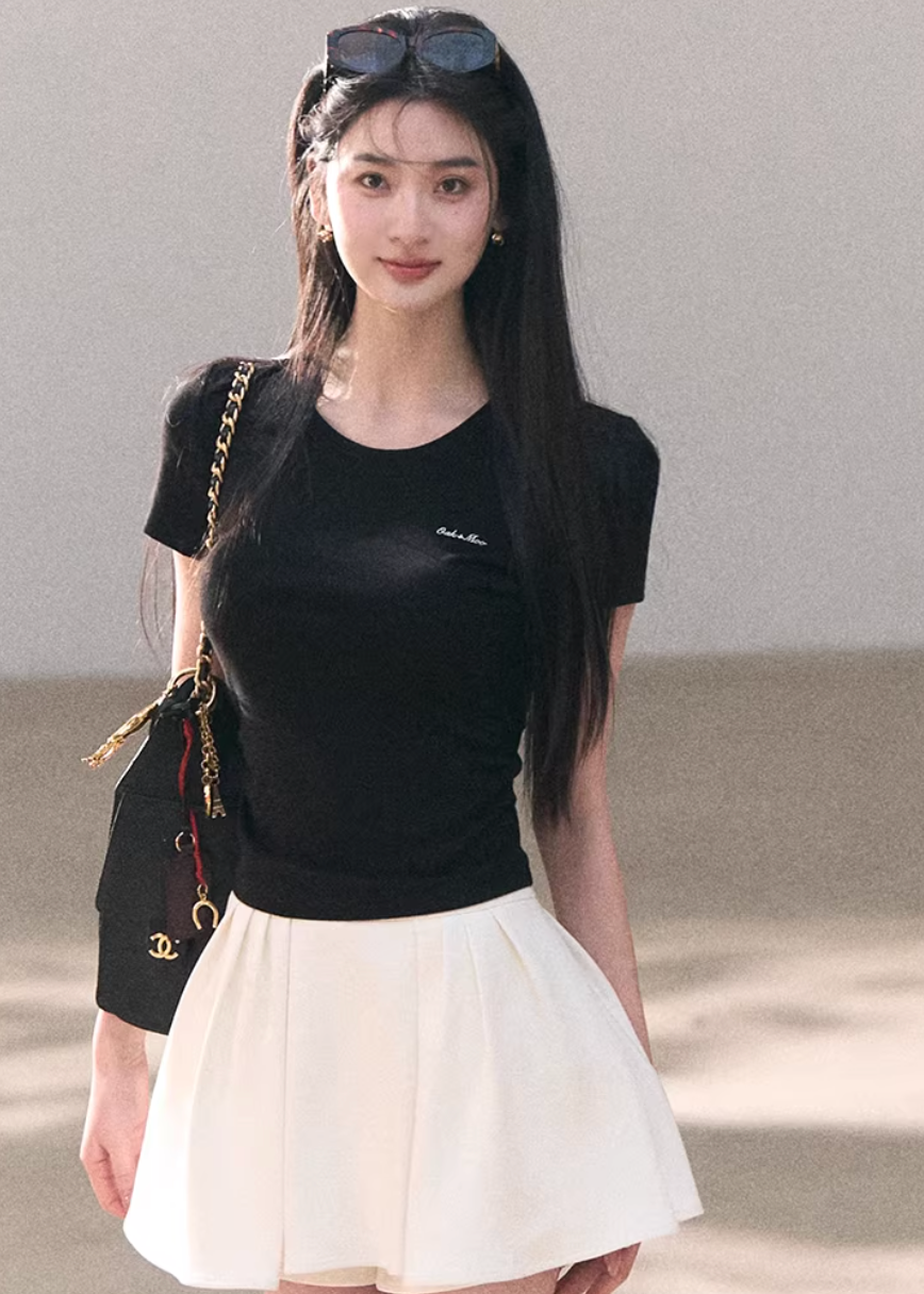 crew neck t shirt women, embroidered logo tee, korean fashion top, spring outfits 2026, casual spring outfits, slim fit t shirt women, minimalist t shirt women, basic essential top, breathable cotton tee, soft aesthetic outfit, modern feminine clothing, parisian style clothing, versatile everyday top, chic casual outfit, clean line t shirt, refined casual wear, simple design top, spring wardrobe essential, fitted t shirt women, effortless style top