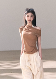 off shoulder knit top women, cut out knit top, lyocell wool top, korean fashion top, spring outfit ideas, casual spring outfits, slim fit knit top, minimalist knitwear women, soft aesthetic outfit, breathable knit top, modern feminine clothing, parisian style clothing, versatile everyday top, chic casual outfit, calm luxury fashion, lightweight knitwear, refined casual wear, fitted knit blouse, effortless style top, spring wardrobe essential