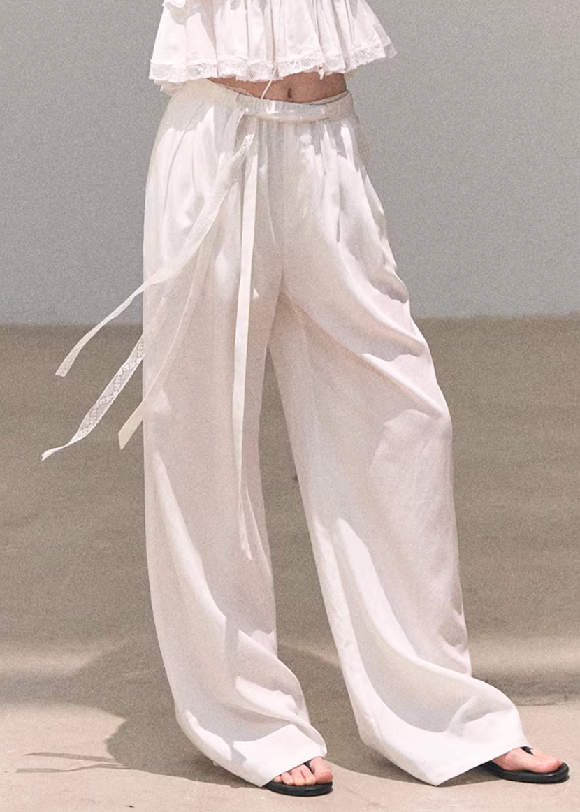 wide leg slacks women, linen blend pants, korean fashion pants, spring outfit ideas, casual spring outfits, relaxed fit trousers women, minimalist wide leg pants, breathable fabric pants, soft aesthetic outfit, modern feminine clothing, parisian style clothing, versatile casual pants, chic everyday outfit, calm luxury fashion, lightweight summer pants, effortless style trousers, natural fabric pants, spring wardrobe bottoms, comfortable wide leg pants, resort style pants