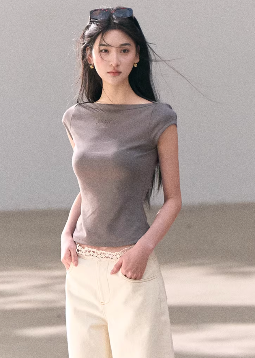 one shoulder t shirt women, asymmetrical top women, korean fashion top, spring outfit ideas, casual spring outfits, slim fit t shirt women, minimalist top women, breathable cotton tee, soft aesthetic outfit, modern feminine clothing, parisian style clothing, versatile everyday top, chic casual outfit, calm luxury fashion, lightweight summer top, effortless style blouse, refined casual wear, spring wardrobe essential, fitted tee women, simple design top