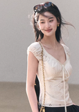 cotton lace top women, bubble sleeve top, korean fashion top, spring outfit ideas, casual spring outfits, slim fit cotton blouse, hollow lace top, feminine casual top, breathable cotton top, soft aesthetic outfit, modern feminine clothing, parisian style clothing, versatile everyday top, chic casual outfit, calm luxury fashion, lightweight summer top, effortless style blouse, refined casual wear, spring wardrobe essential, minimal feminine top