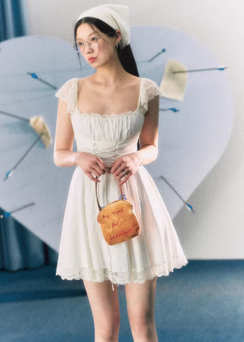 white lace dress women, camisole mini dress, korean fashion dress, spring brunch outfit, brunch outfit ideas, summer outfit ideas, feminine mini dress, aesthetic fashion dress, soft girl aesthetic outfit, modern feminine clothing, parisian style clothing, romantic lace dress, versatile summer dress, chic everyday outfit, lightweight summer dress, elegant casual dress, spring wardrobe dress, delicate lace dress, cute summer outfit, feminine style dress