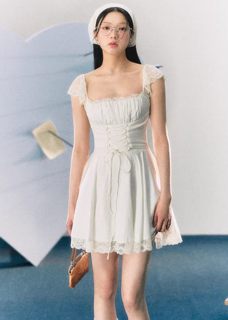 white lace dress women, camisole mini dress, korean fashion dress, spring brunch outfit, brunch outfit ideas, summer outfit ideas, feminine mini dress, aesthetic fashion dress, soft girl aesthetic outfit, modern feminine clothing, parisian style clothing, romantic lace dress, versatile summer dress, chic everyday outfit, lightweight summer dress, elegant casual dress, spring wardrobe dress, delicate lace dress, cute summer outfit, feminine style dress