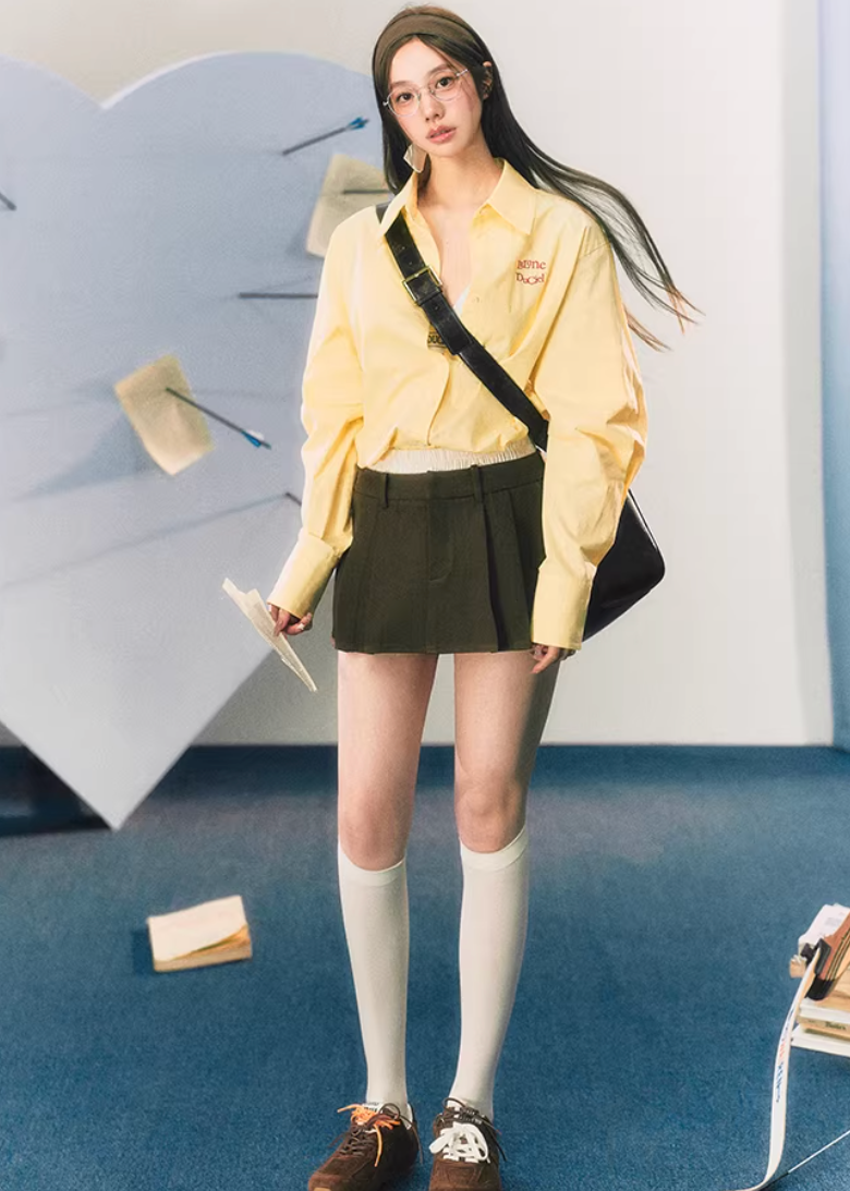 lapel shirt women, embroidered logo shirt, korean fashion top, spring brunch outfit, brunch outfit ideas, summer outfit ideas, college style shirt women, loose fit blouse women, aesthetic fashion top, modern feminine clothing, parisian style clothing, versatile everyday top, chic casual outfit, lightweight summer shirt, preppy style outfit, effortless style blouse, spring wardrobe essential, minimal style shirt, casual chic top, feminine outfit top