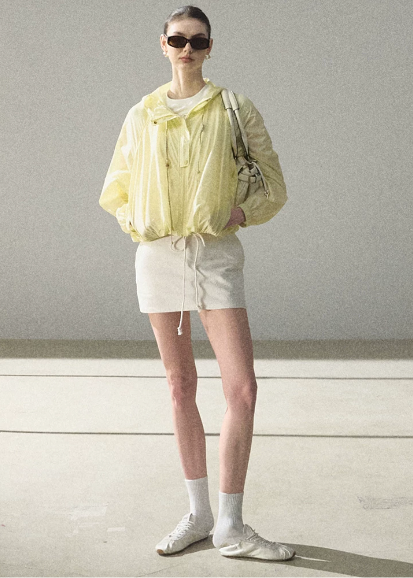 hooded jacket women, sunscreen jacket women, korean fashion outerwear, minimal outfit women, effortless outfit ideas, casual summer outfits, uv protection clothing, lightweight jacket women, modern feminine clothing, parisian style clothing, versatile outerwear women, chic casual outfit, breathable summer jacket, travel outfit women, relaxed fit jacket women, everyday layering jacket, clean silhouette jacket, simple functional clothing, summer wardrobe jacket, outdoor casual outfit

