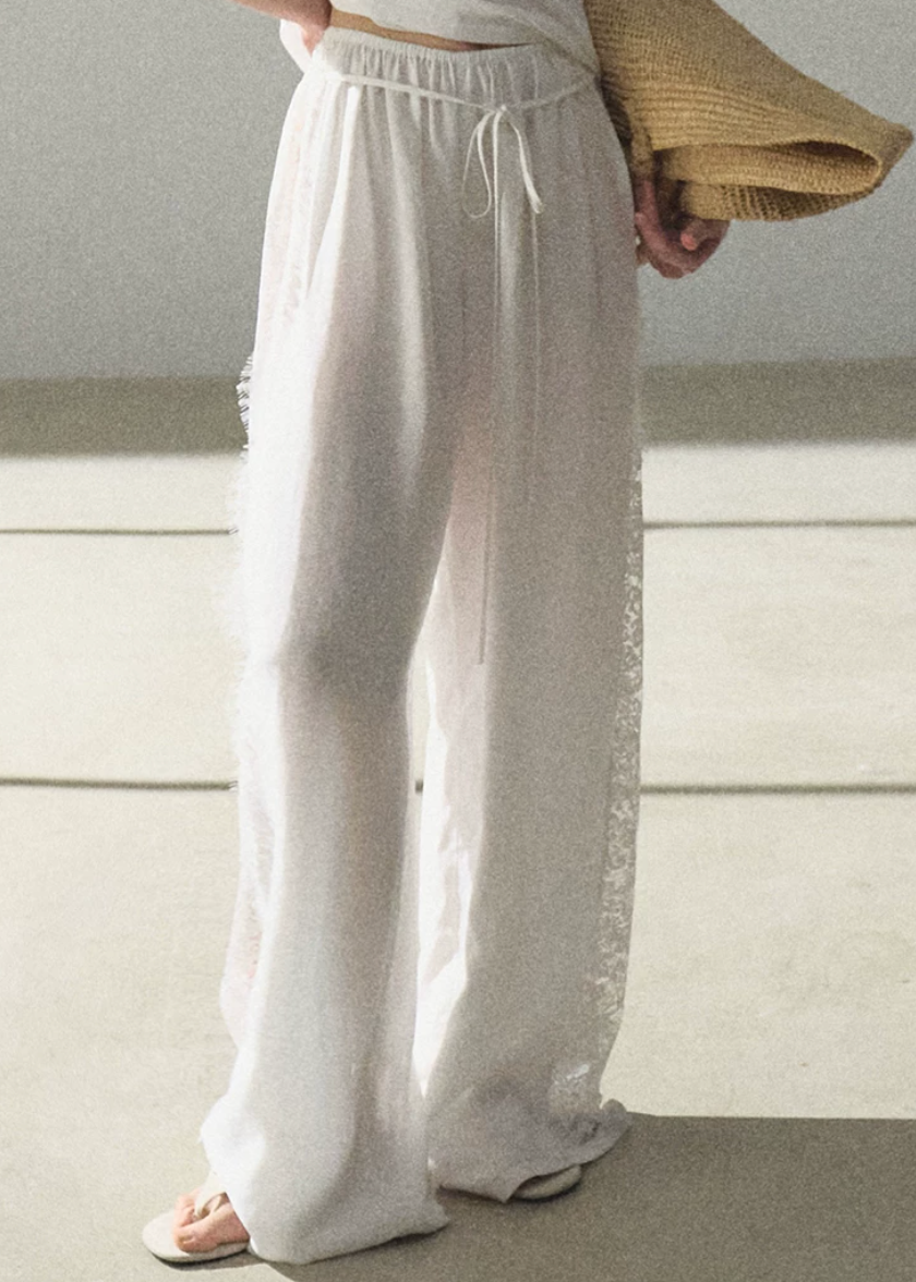 wide leg pants women, lace panel trousers, korean fashion pants, minimal outfit women, effortless outfit ideas, casual summer outfits, lightweight summer pants, modern feminine clothing, parisian style clothing, versatile wide pants, chic everyday outfit, calm luxury fashion, breathable fabric pants, relaxed fit trousers women, natural fabric clothing, elegant casual pants, summer wardrobe bottoms, drape pants women, soft aesthetic outfit, simple elegant clothing

