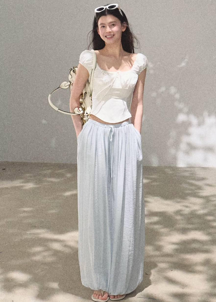 silk pants women, wide leg trousers women, korean fashion pants, minimal outfit women, effortless outfit ideas, casual summer outfits, mulberry silk pants, modern feminine clothing, parisian style clothing, versatile wide pants, chic everyday outfit, calm luxury fashion, breathable summer pants, relaxed fit trousers women, natural fabric clothing, elegant casual pants, summer wardrobe bottoms, lightweight silk trousers, clean silhouette pants, simple elegant outfit

