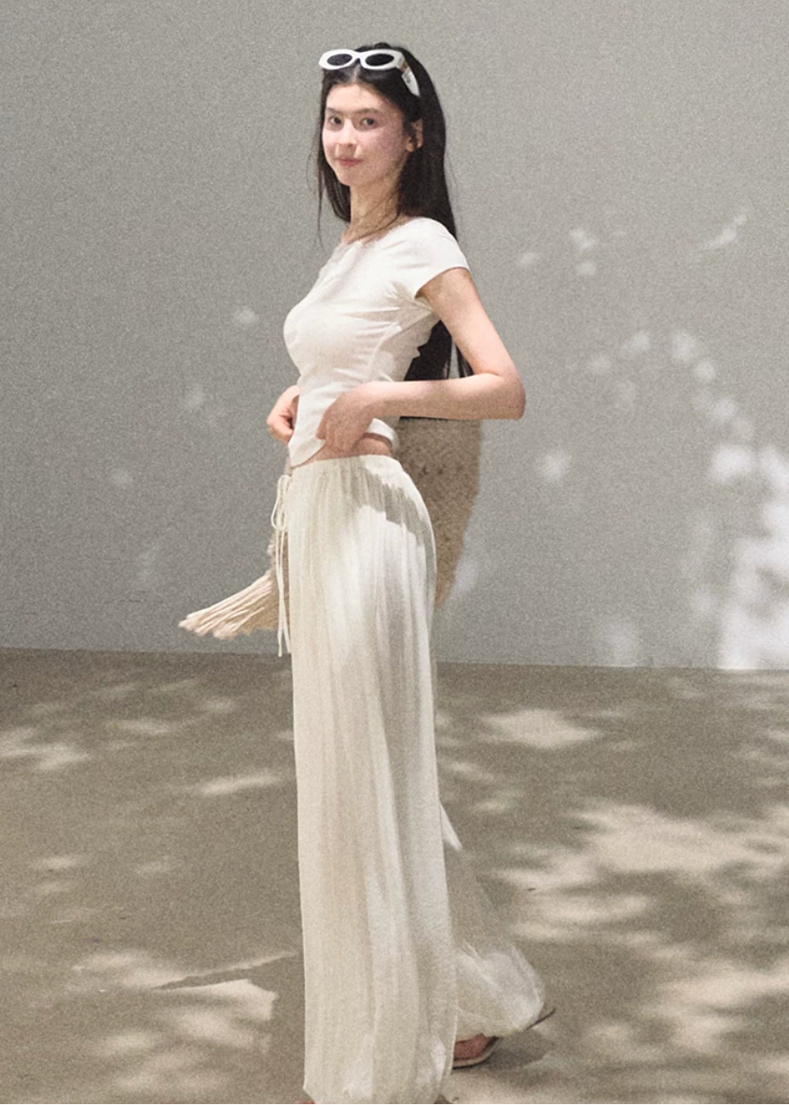 silk pants women, wide leg trousers women, korean fashion pants, minimal outfit women, effortless outfit ideas, casual summer outfits, mulberry silk pants, modern feminine clothing, parisian style clothing, versatile wide pants, chic everyday outfit, calm luxury fashion, breathable summer pants, relaxed fit trousers women, natural fabric clothing, elegant casual pants, summer wardrobe bottoms, lightweight silk trousers, clean silhouette pants, simple elegant outfit
