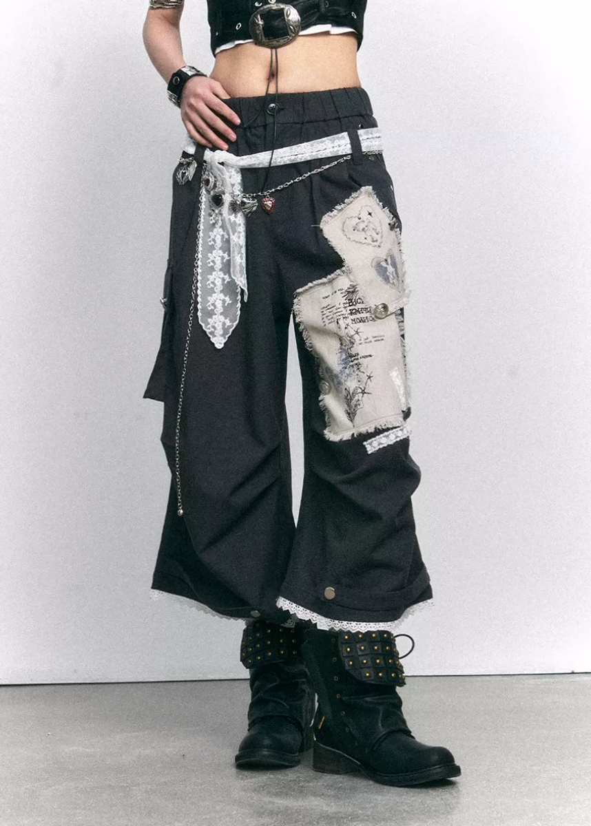 wide leg cropped pants women, patchwork pants women, distressed trousers women, grunge outfit women, edgy outfit women, street style pants, punk style clothing, y2k edgy outfit, alternative fashion women, deconstructed pants, raw edge trousers, urban streetwear women, lace panel pants, statement pants women, loose fit trousers women, rebellious fashion outfit, underground fashion women, utility style pants, mixed fabric pants, edgy streetwear women