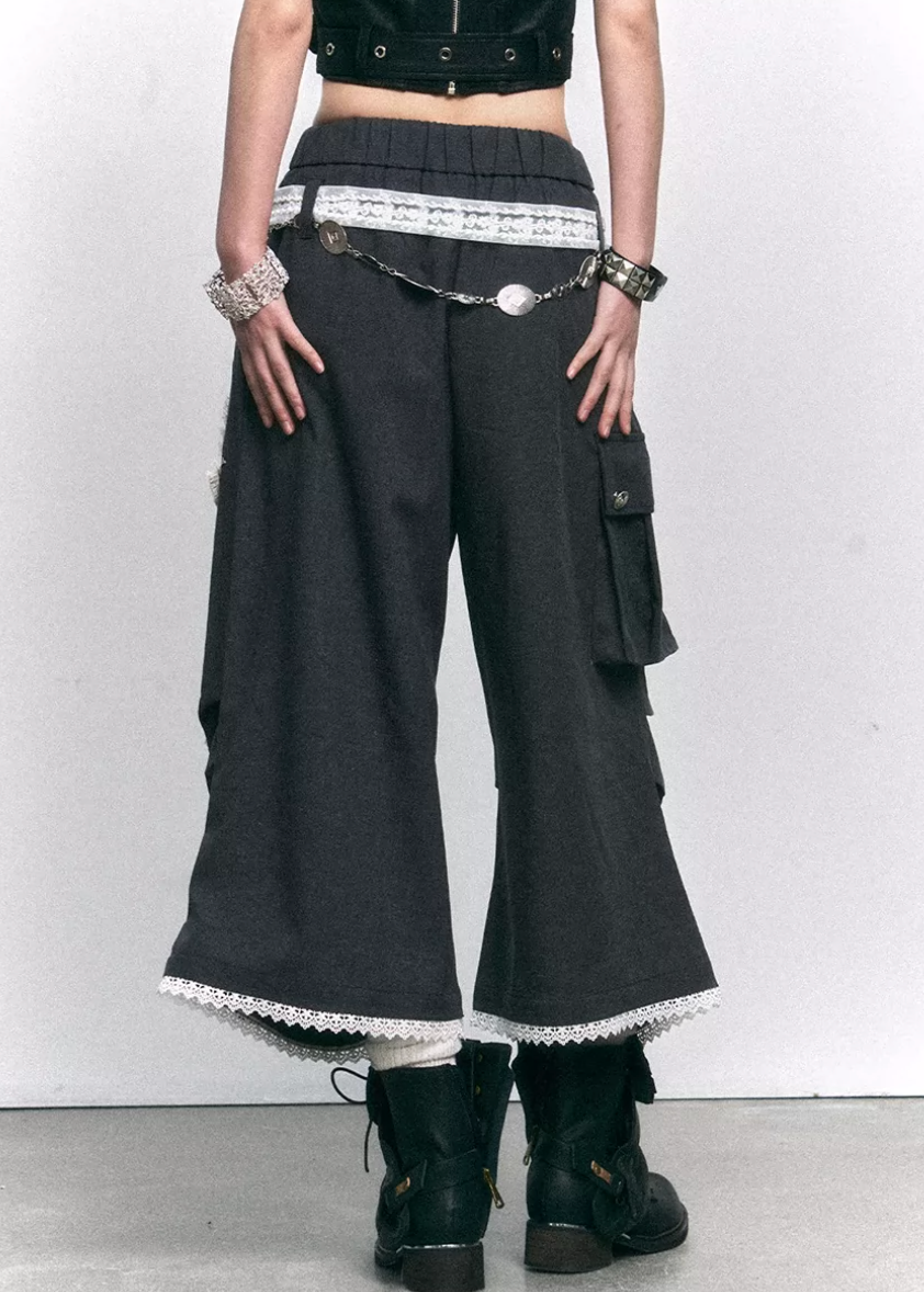 wide leg cropped pants women, patchwork pants women, distressed trousers women, grunge outfit women, edgy outfit women, street style pants, punk style clothing, y2k edgy outfit, alternative fashion women, deconstructed pants, raw edge trousers, urban streetwear women, lace panel pants, statement pants women, loose fit trousers women, rebellious fashion outfit, underground fashion women, utility style pants, mixed fabric pants, edgy streetwear women