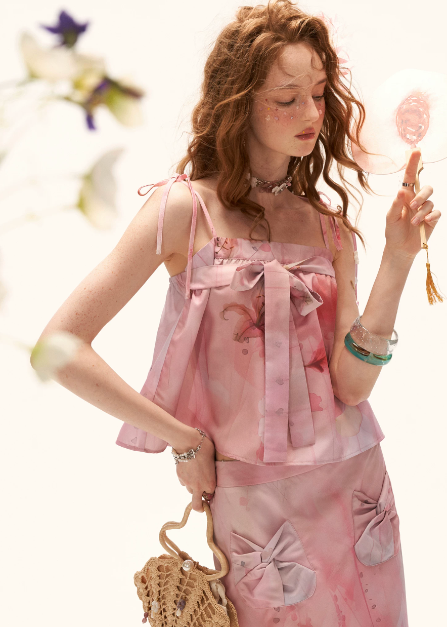 camisole top women, bow camisole top, floral camisole women, summer top women, korean fashion top, aesthetic outfit women, peach color top women, slim fit camisole, feminine summer top, lightweight summer top, cute summer top, vacation outfit women, elegant casual top, trendy camisole women, everyday summer outfit, chic summer outfit, romantic outfit top, statement camisole top, stylish summer top, fashion forward top