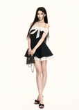 off shoulder dress women, black mini dress women, contrast dress women, bow dress women, korean fashion dress, a line dress women, slim fit dress women, elegant mini dress, summer outfit ideas, vacation dress women, chic minimal dress, short dress women, modern feminine outfit, flattering waist dress, stylish black dress, trendy mini dress, parisian style dress, statement mini dress, clean silhouette dress, refined mini dress
