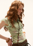 summer 2026 outfits, summer outfit ideas, vacation outfit women, brunch outfit women, picnic outfit women, casual summer outfits women, sheer green top, vintage polo top women, flutter sleeve blouse, beaded summer top, french vintage outfit, european summer outfit, lightweight summer blouse, romantic summer fashion, soft aesthetic clothing