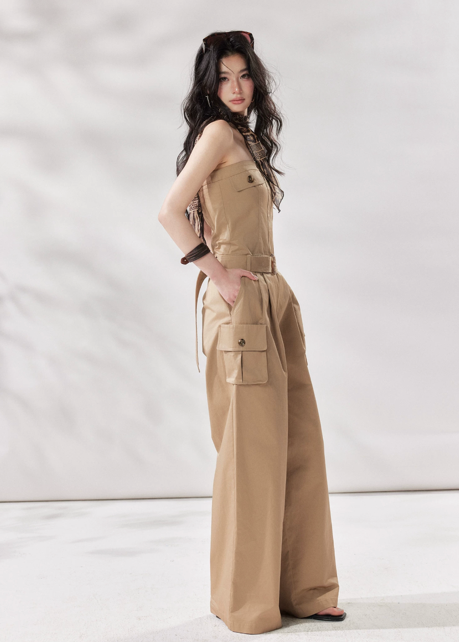 cargo jumpsuit women, strapless jumpsuit women, bandeau jumpsuit, utility jumpsuit women, wide leg jumpsuit women, summer jumpsuit outfit women, beige jumpsuit women, modern minimal outfit women, street style jumpsuit women, fashion forward jumpsuit, elevated casual outfit women, one piece outfit women, trendy cargo outfit women, chic summer jumpsuit, stylish utility outfit