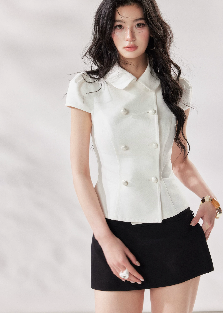 white denim shirt women, double breasted shirt women, doll collar blouse, french style summer shirt, short sleeve denim top, structured white top, chic summer outfit women, korean fashion blouse, modern casual shirt, elevated everyday top