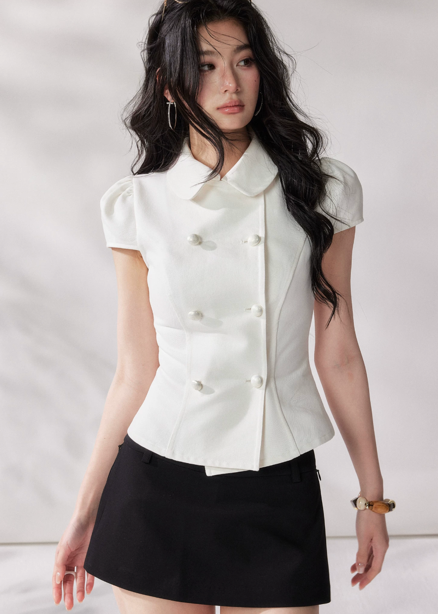 white denim shirt women, double breasted shirt women, doll collar blouse, french style summer shirt, short sleeve denim top, structured white top, chic summer outfit women, korean fashion blouse, modern casual shirt, elevated everyday top