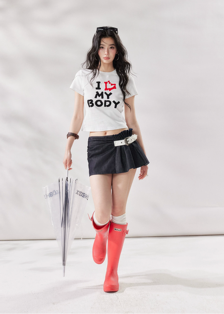 high waist mini skirt, belted mini skirt women, shirred waist skirt, irregular a line skirt, white mini skirt, black mini skirt, american style skirt, summer skirt women, korean fashion skirt, stylish casual skirt, trendy summer outfit, city style outfit women