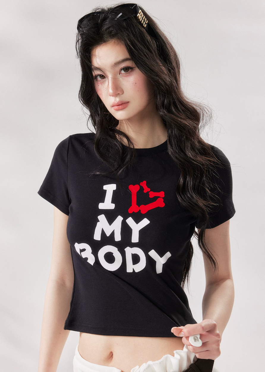 graphic baby tee, cropped t shirt women, letter print t shirt, korean fashion top, summer crop tee, black graphic tee women, white graphic tee women, slim fit t shirt, stylish casual top, cool girl outfit, summer street style top, modern casual tee