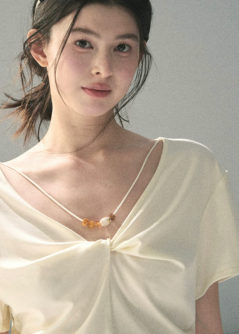 aomalm top, white v neck top, twist front top, korean fashion top, waist cinched top, feminine summer blouse, lyocell top women, soft commuter top, elegant casual top, white short sleeve top, korean style daily top, flattering summer top