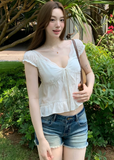 low rise denim shorts, vintage denim shorts, fringe denim shorts, distressed denim shorts, cat whisker shorts, American vintage shorts, women’s hot shorts, casual denim shorts, summer denim shorts, frayed hem shorts, Korean feminine styling, resort denim shorts, cotton blend denim shorts, washed denim shorts, vacation shorts outfit
