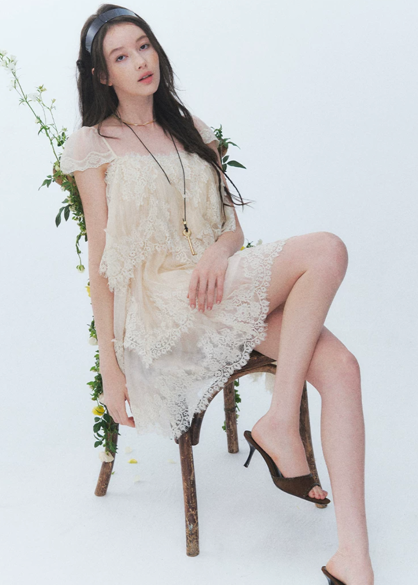 irregular lace dress, lace cake dress, summer lace mini dress, beach holiday dress, Korean feminine dress, French lace dress, resort lace dress, vintage lace dress, layered lace dress, romantic summer dress, lace vacation dress, asymmetric hem dress, feminine Korean fashion, cream lace dress, black lace mini dress