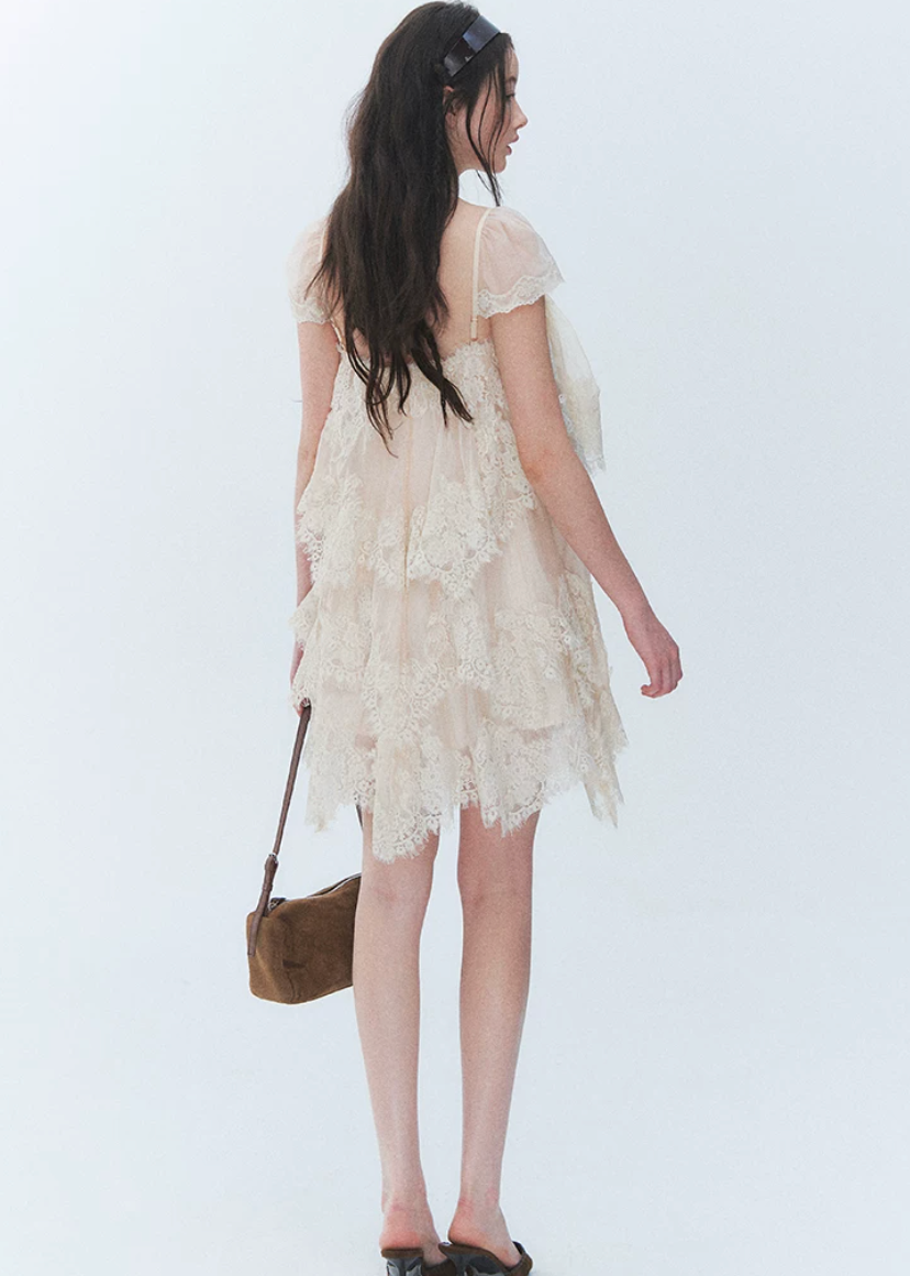 irregular lace dress, lace cake dress, summer lace mini dress, beach holiday dress, Korean feminine dress, French lace dress, resort lace dress, vintage lace dress, layered lace dress, romantic summer dress, lace vacation dress, asymmetric hem dress, feminine Korean fashion, cream lace dress, black lace mini dress