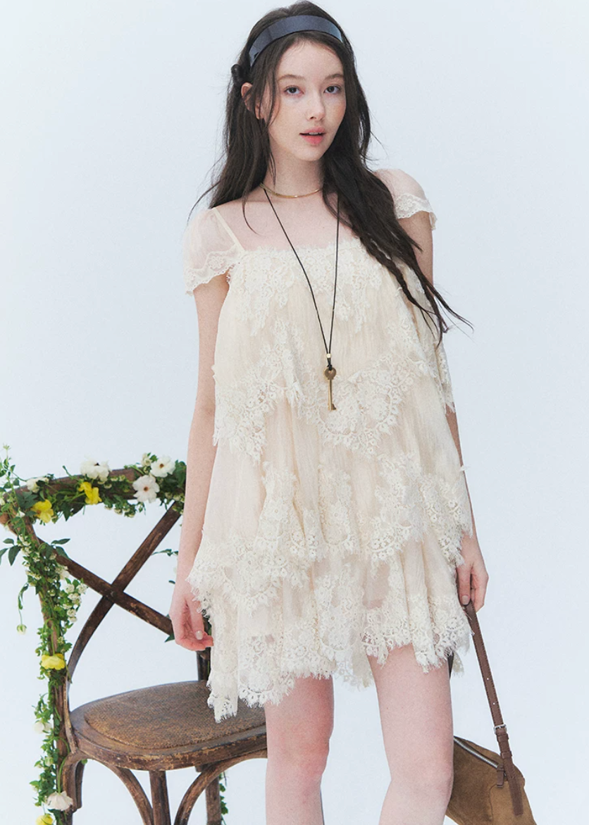 irregular lace dress, lace cake dress, summer lace mini dress, beach holiday dress, Korean feminine dress, French lace dress, resort lace dress, vintage lace dress, layered lace dress, romantic summer dress, lace vacation dress, asymmetric hem dress, feminine Korean fashion, cream lace dress, black lace mini dress