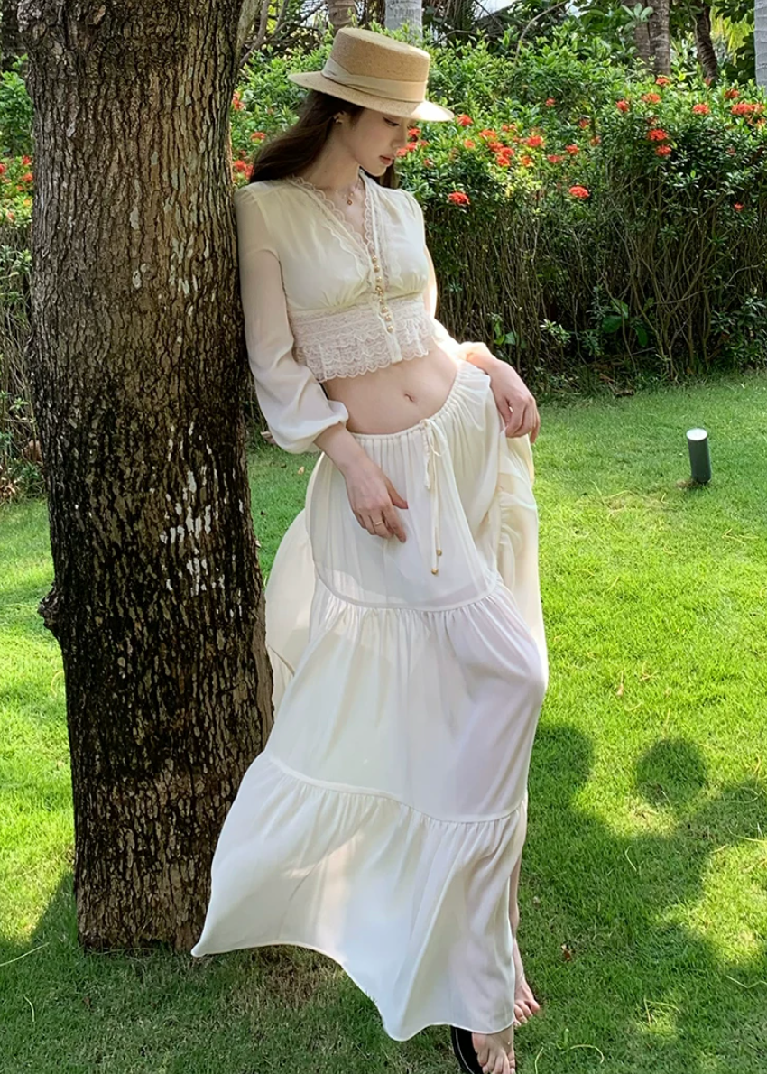 chiffon cake skirt, low rise maxi skirt, resort style skirt, tiered chiffon skirt, feminine Korean skirt, romantic summer skirt, draped long skirt, beach vacation skirt, airy summer skirt, soft chiffon maxi skirt, elegant resort outfit, flowing tiered skirt, Korean feminine fashion, vacation ready skirt, lightweight long skirt