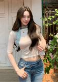 off shoulder knit top, minimalist knit top, slimming knit top, Korean feminine top, solid color knit tee, mid sleeve knit top, elegant summer knit, soft slim fit top, versatile knit blouse, feminine Korean fashion, collarbone knit top, acrylic lyocell wool top, mulberry silk knit top, casual elegant top, fitted knitwear women