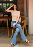 vintage flared jeans, slim flared jeans, women flare denim pants, Korean style jeans, feminine flared jeans, summer denim pants, vintage blue jeans women, black flare jeans women, leg lengthening jeans, slim fit denim trousers, high waist flare jeans, casual chic jeans women, retro flare pants, versatile women jeans, fitted flare denim