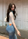 vintage flared jeans, slim flared jeans, women flare denim pants, Korean style jeans, feminine flared jeans, summer denim pants, vintage blue jeans women, black flare jeans women, leg lengthening jeans, slim fit denim trousers, high waist flare jeans, casual chic jeans women, retro flare pants, versatile women jeans, fitted flare denim