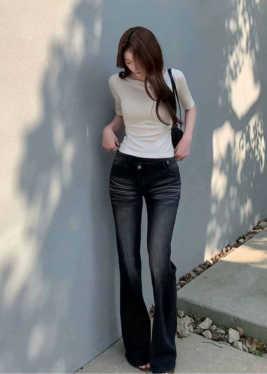 vintage flared jeans, slim flared jeans, women flare denim pants, Korean style jeans, feminine flared jeans, summer denim pants, vintage blue jeans women, black flare jeans women, leg lengthening jeans, slim fit denim trousers, high waist flare jeans, casual chic jeans women, retro flare pants, versatile women jeans, fitted flare denim