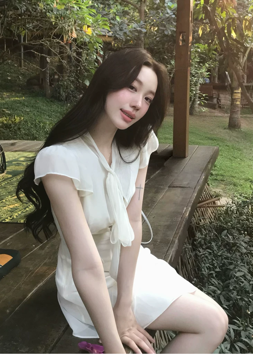 bow-tie chiffon mini dress, white chiffon dress, flutter sleeve mini dress, feminine korean dress, romantic summer dress, fit and flare mini dress, tie-neck dress, elegant white mini dress, soft girl summer dress, vacation mini dress, café date dress, graceful chiffon dress