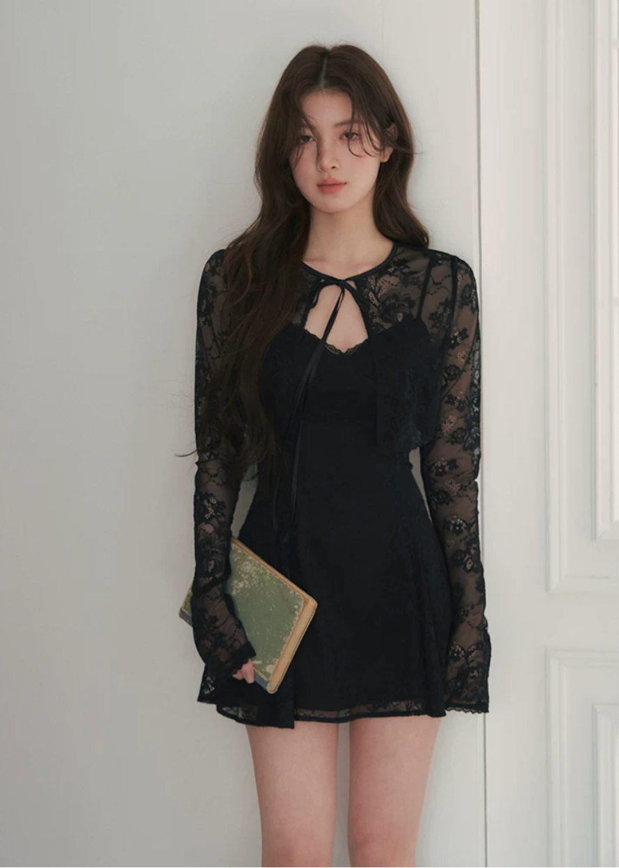lace cardigan set, black mini dress set, lace sleeve dress, waist cinching dress set, feminine Korean dress, romantic black outfit, elegant two piece dress set, sheer lace cardigan, date night mini dress, fitted strap dress, soft goth feminine dress, summer black dress set, delicate lace outfit, party mini dress women, Korean feminine style
