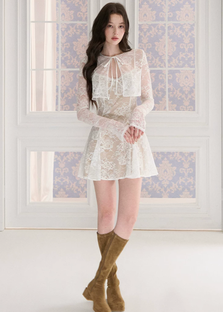lace cardigan set, black mini dress set, lace sleeve dress, waist cinching dress set, feminine Korean dress, romantic black outfit, elegant two piece dress set, sheer lace cardigan, date night mini dress, fitted strap dress, soft goth feminine dress, summer black dress set, delicate lace outfit, party mini dress women, Korean feminine style