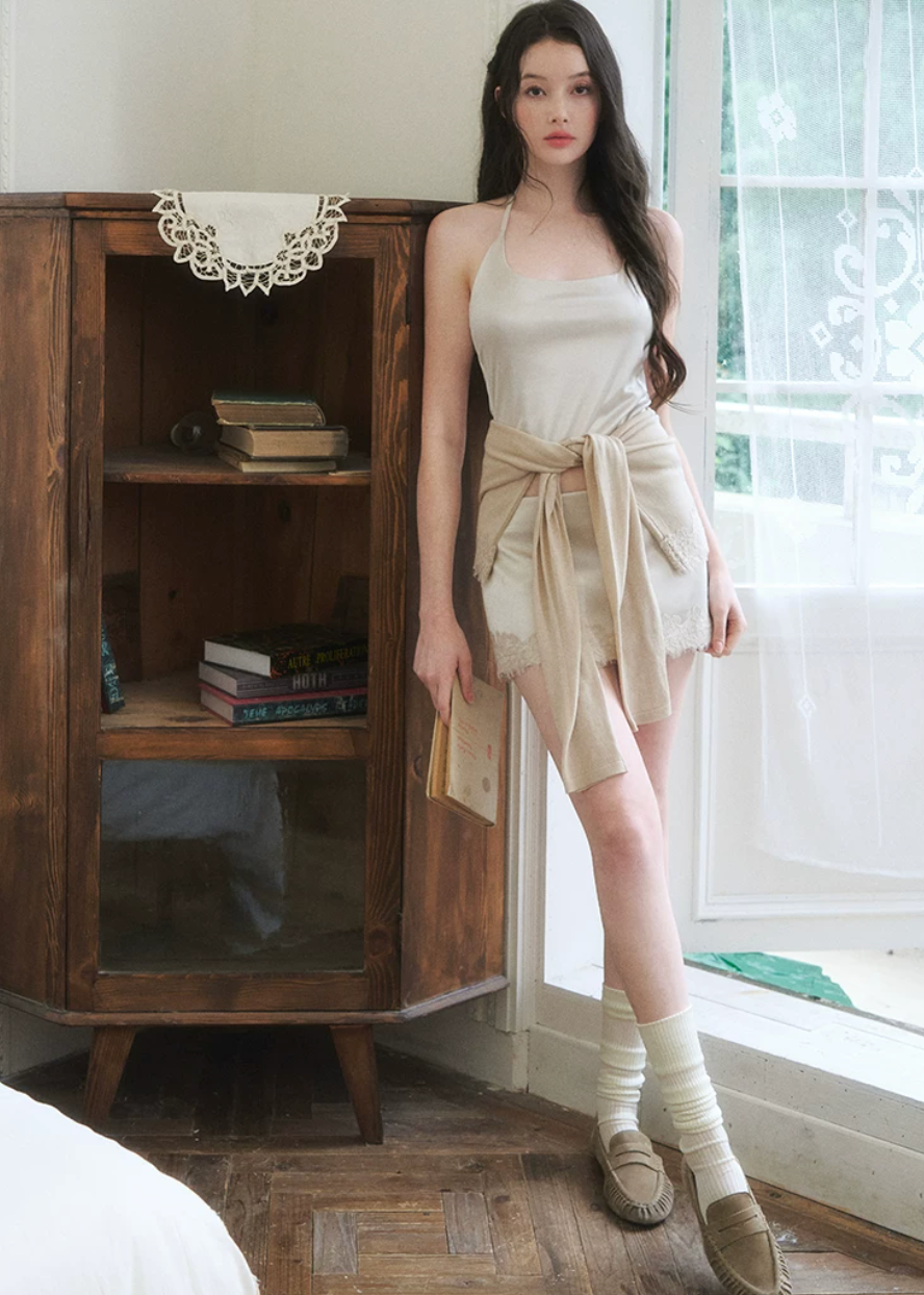 halter cardigan skirt set, three piece skirt set, asymmetrical cardigan set, Korean feminine set, bodycon mini skirt set, beige summer outfit, romantic cardigan set, camisole skirt set, feminine vacation outfit, date night outfit women, soft draped cardigan, elegant Korean fashion, summer matching set, halter camisole set, mini skirt co ord