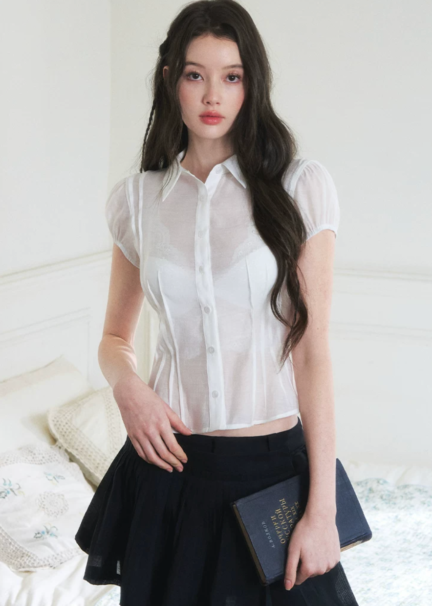 sheer button shirt, bubble sleeve blouse, slim fit sheer top, Korean feminine blouse, short sleeve sheer shirt, romantic button blouse, lightweight summer blouse, viscose lyocell top, soft sheer blouse, feminine office top, café date outfit top, pure desire shirt, elegant casual blouse, translucent shirt women, Korean style summer top