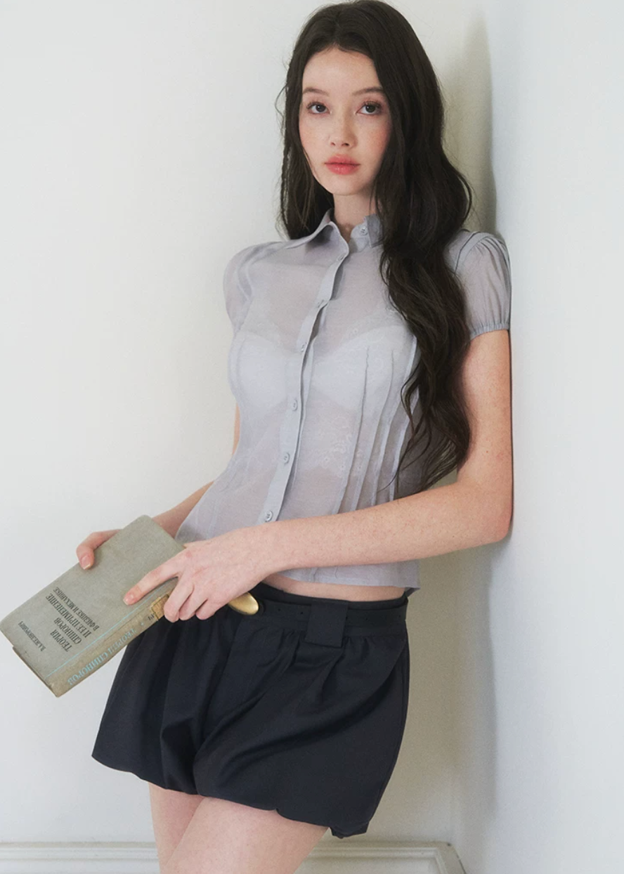sheer button shirt, bubble sleeve blouse, slim fit sheer top, Korean feminine blouse, short sleeve sheer shirt, romantic button blouse, lightweight summer blouse, viscose lyocell top, soft sheer blouse, feminine office top, café date outfit top, pure desire shirt, elegant casual blouse, translucent shirt women, Korean style summer top