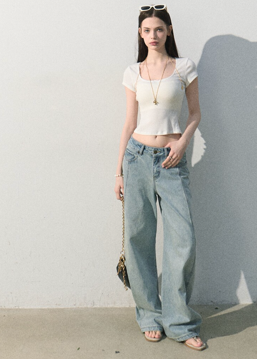 Short-sleeve textured top with delicate neckline detail