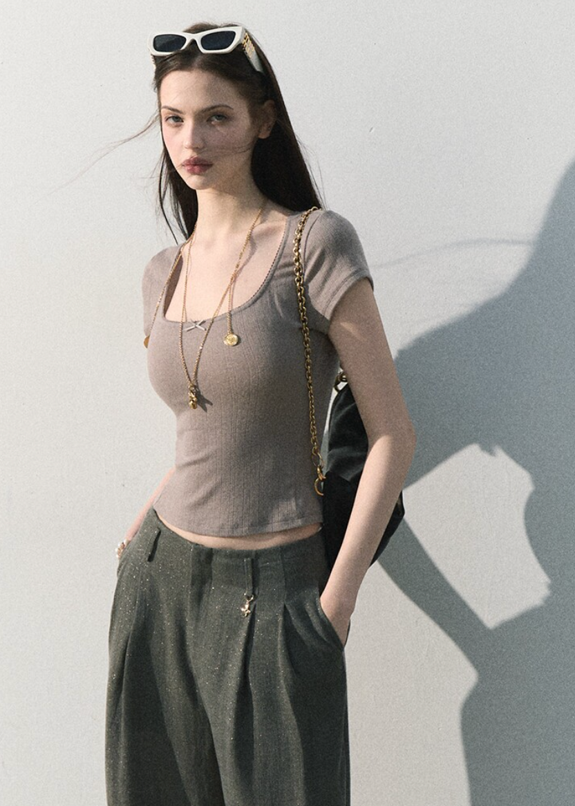 Close-fitting U-neck top in a soft iced mint shade