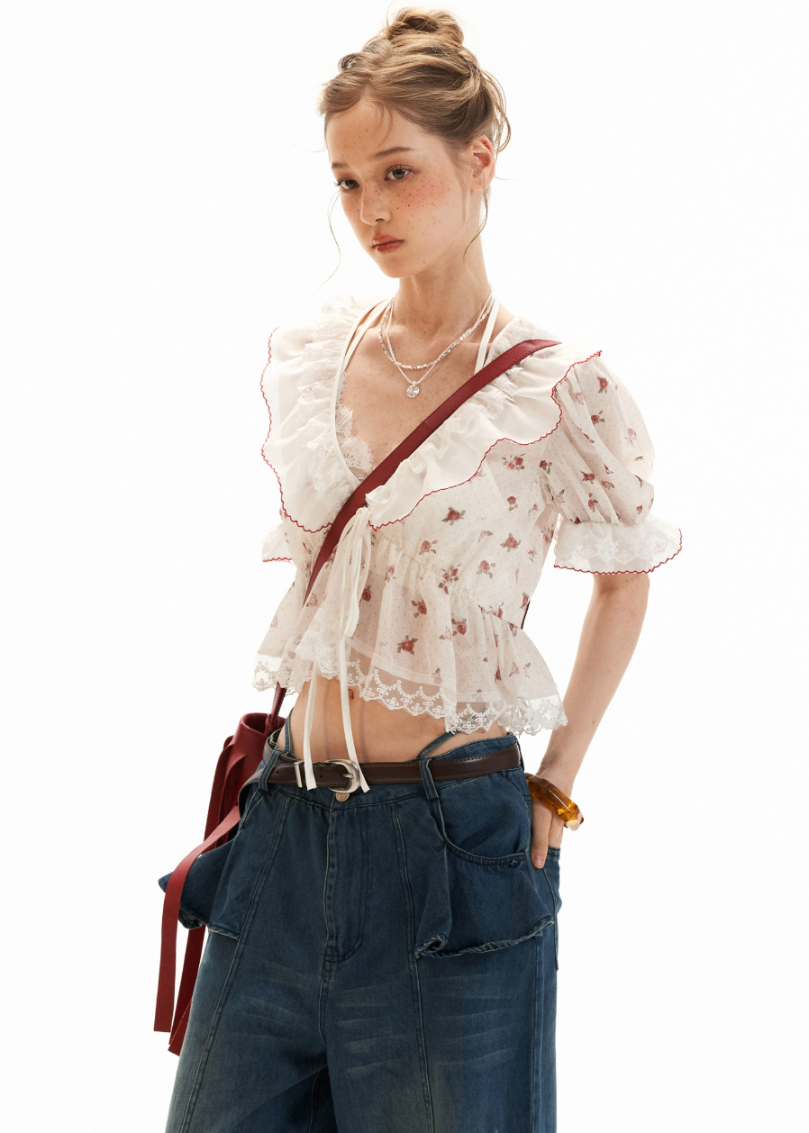 Floral ruffle blouse with a cropped fit