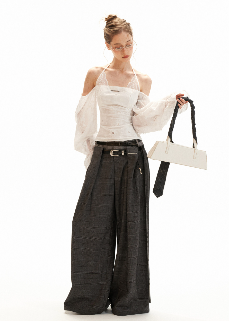 White flared sleeve top styled with oversized trousers
