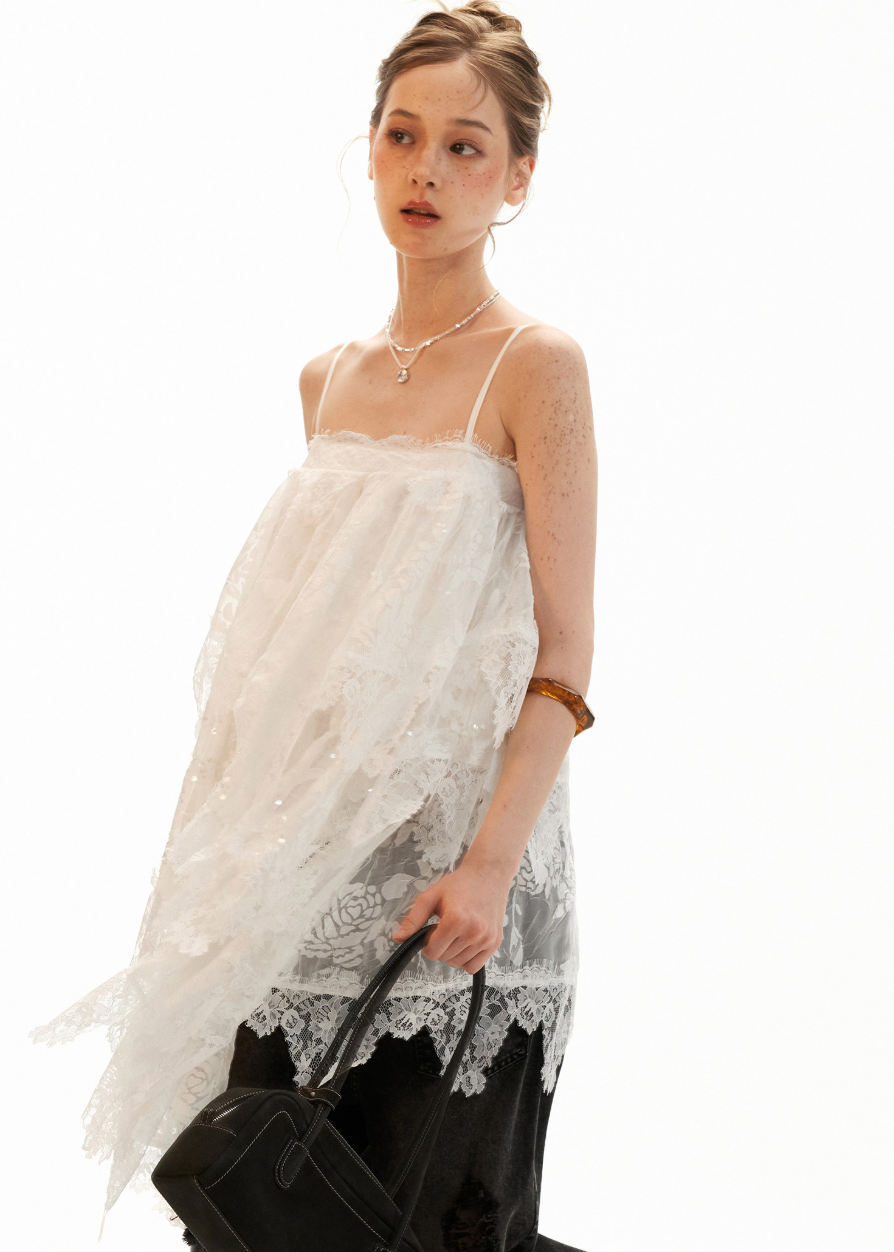 Spaghetti strap mini dress with sheer mesh and lace texture