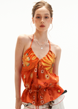 Orange floral halter top with a backless tie design