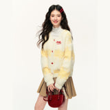 ゆったりとした万能な甘いリボン結びのクリームイエローのロングカーディガンジャケット