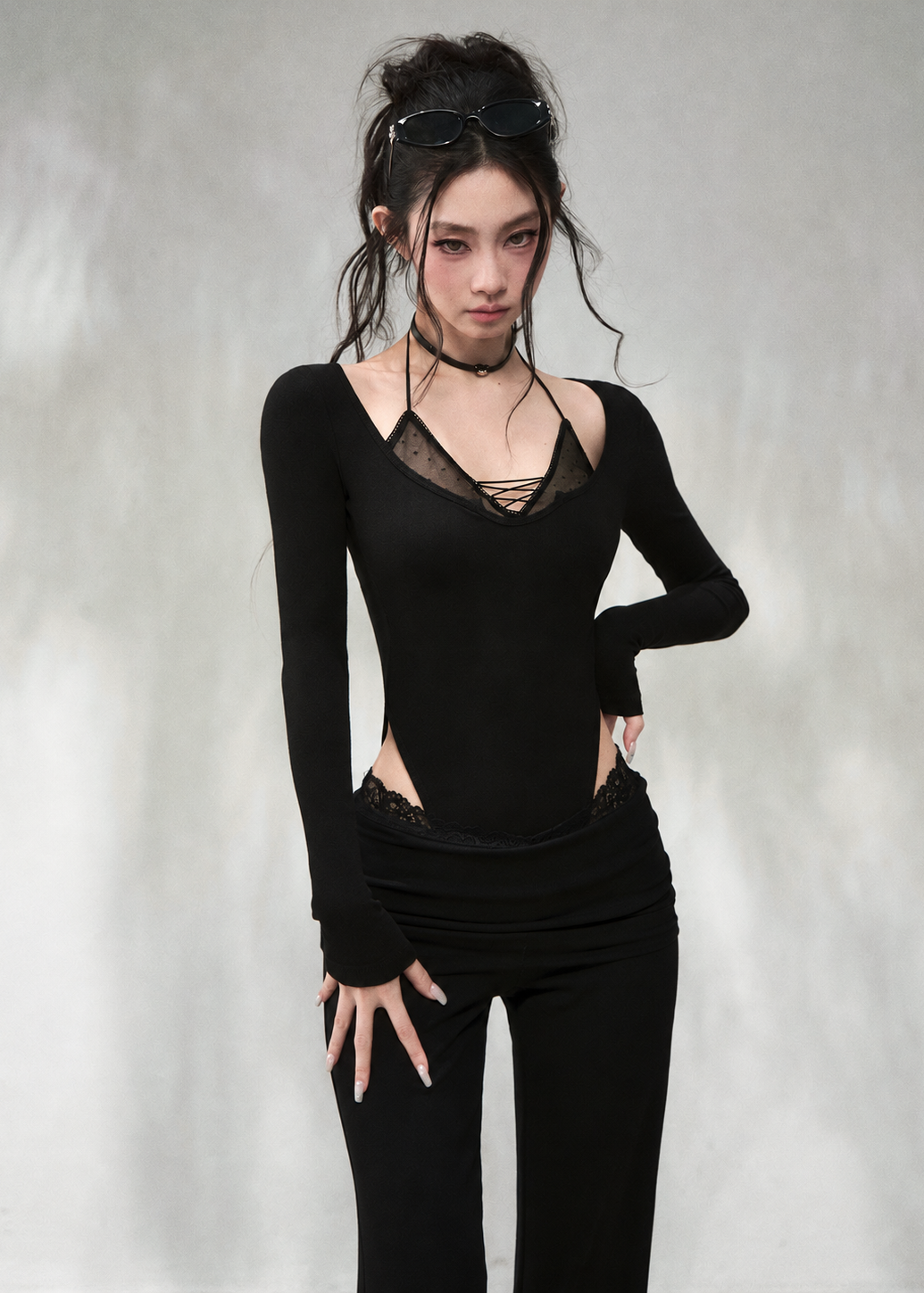 Black wide V-neck long sleeve top with faux layered design