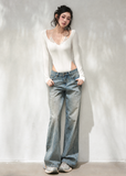 Halter-inspired knit top with delicate mesh and lace-up details