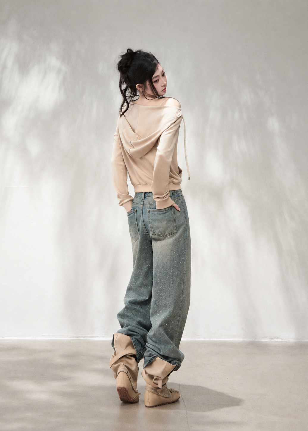 Soft lyocell blend long sleeve hoodie with shoulder strap accents